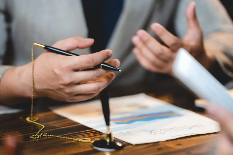 Legal documents and a pen on a counsel’s desk